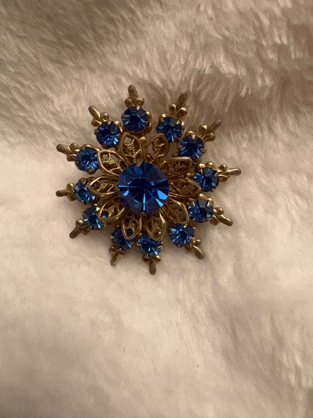 Vintage Gold Snowflake Brooch with Royal Blue Rhinestones